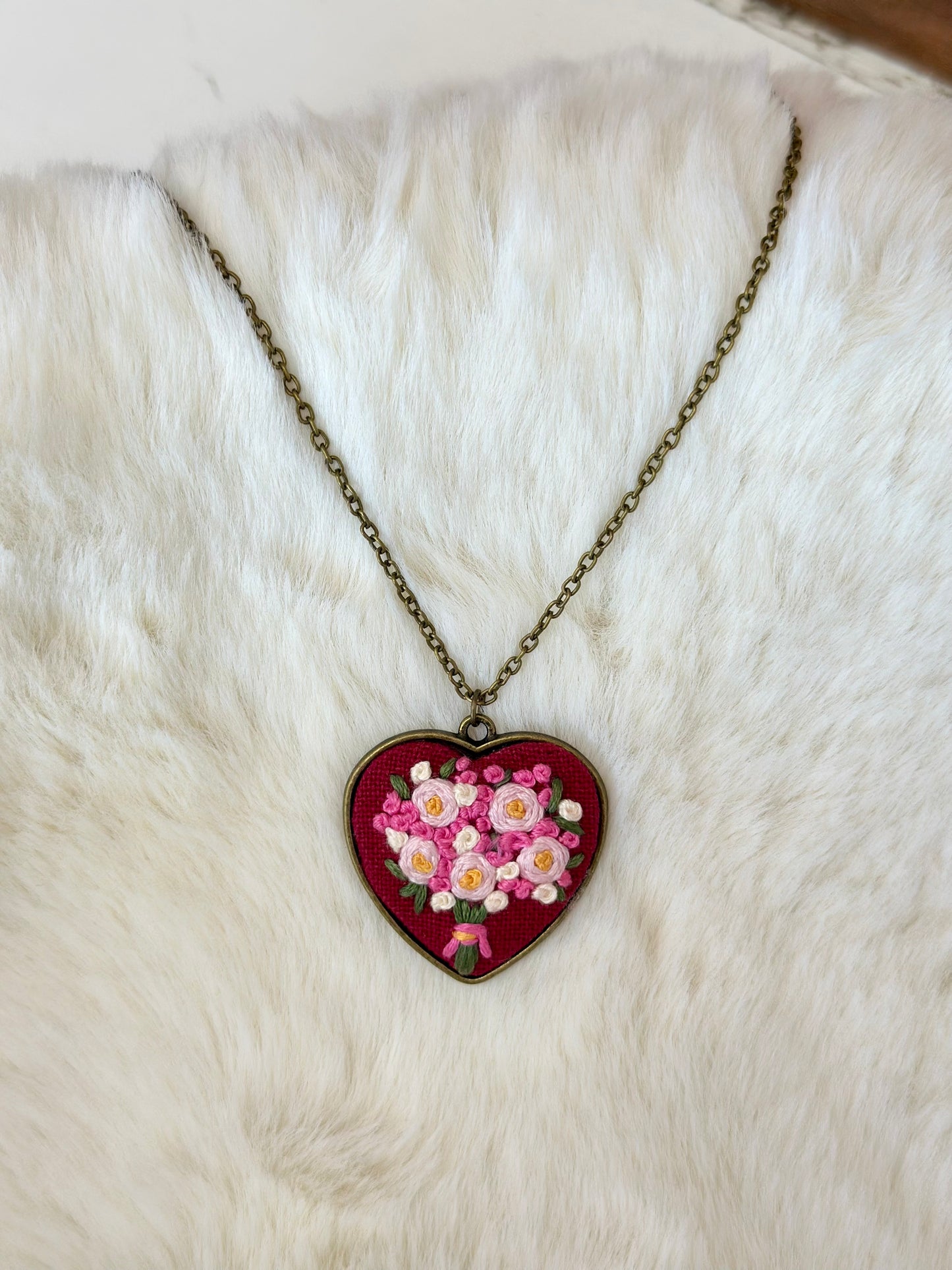 Heart embroidered pendant