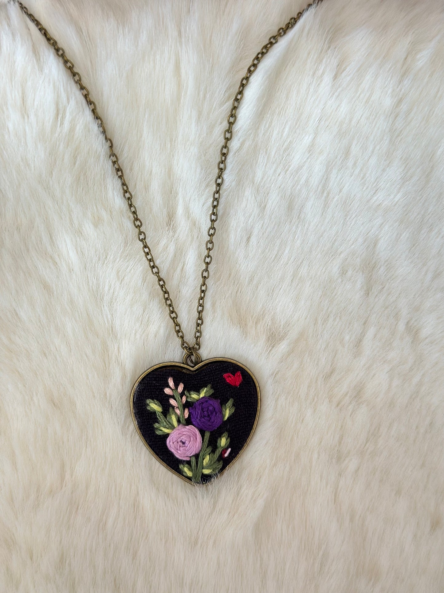Heart embroidered pendant