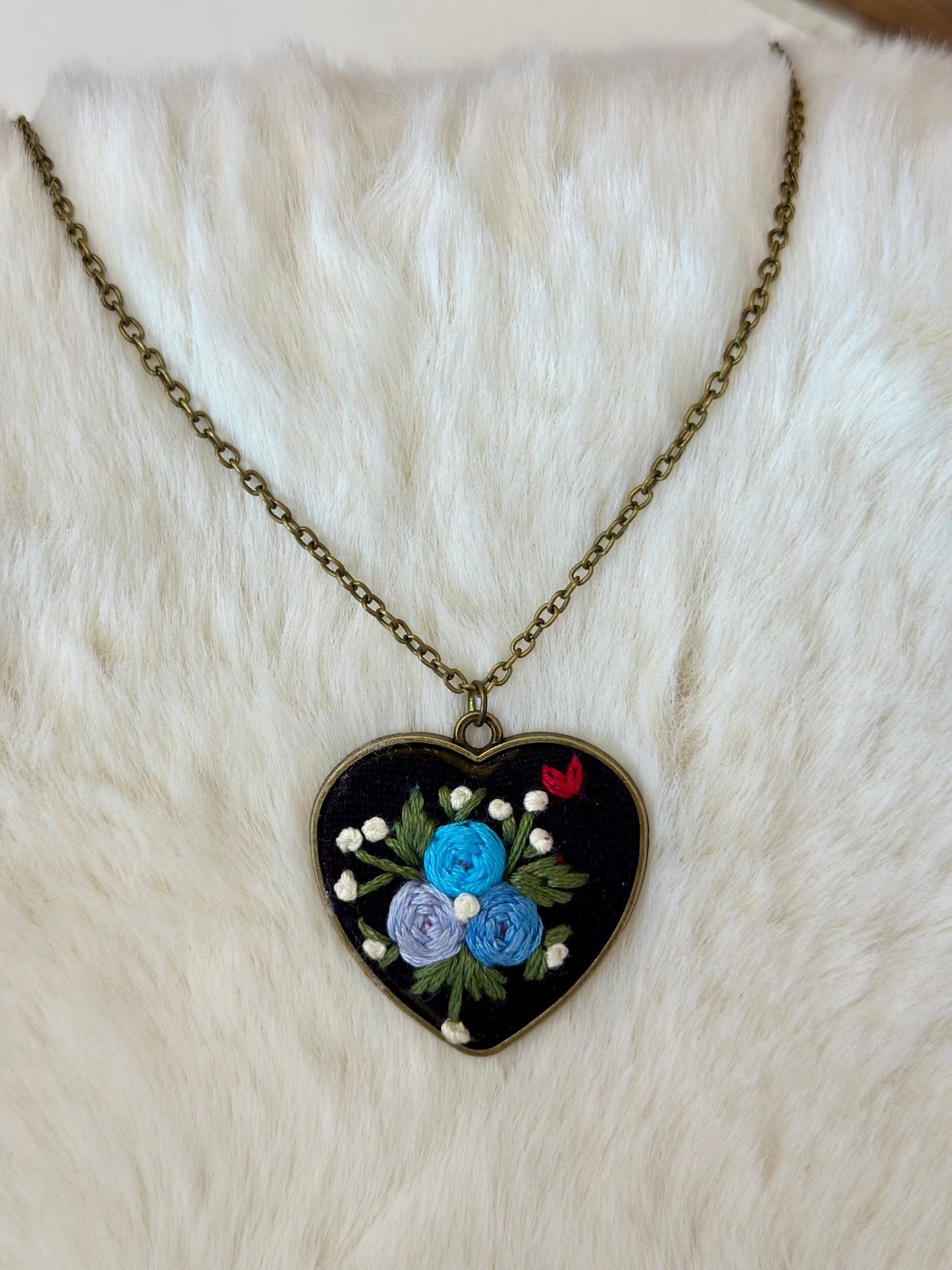 Heart embroidered pendant