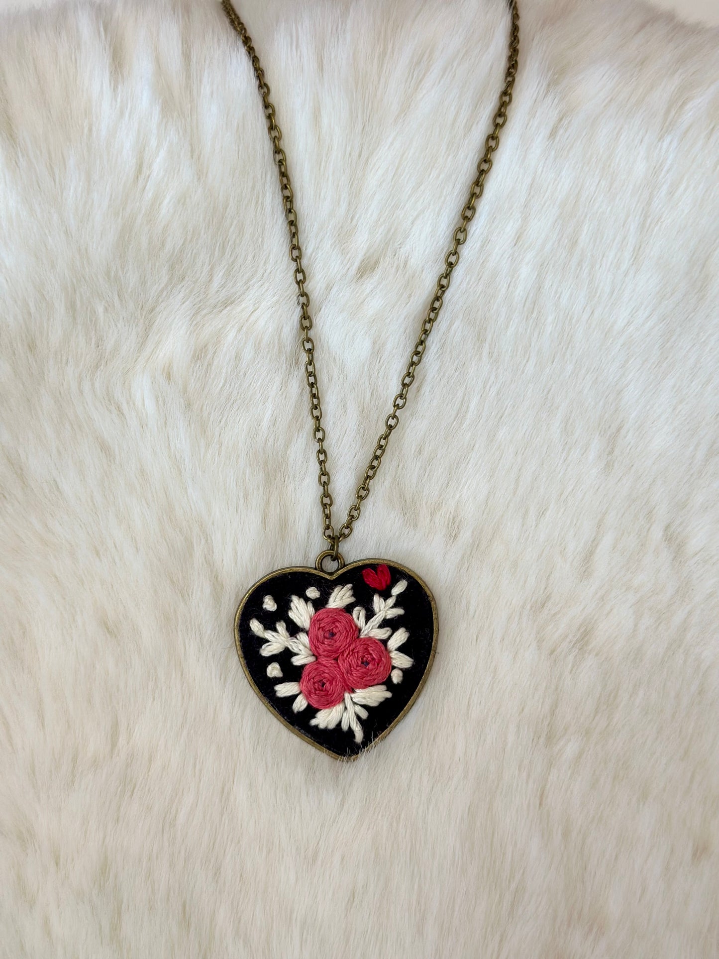 Heart embroidered pendant