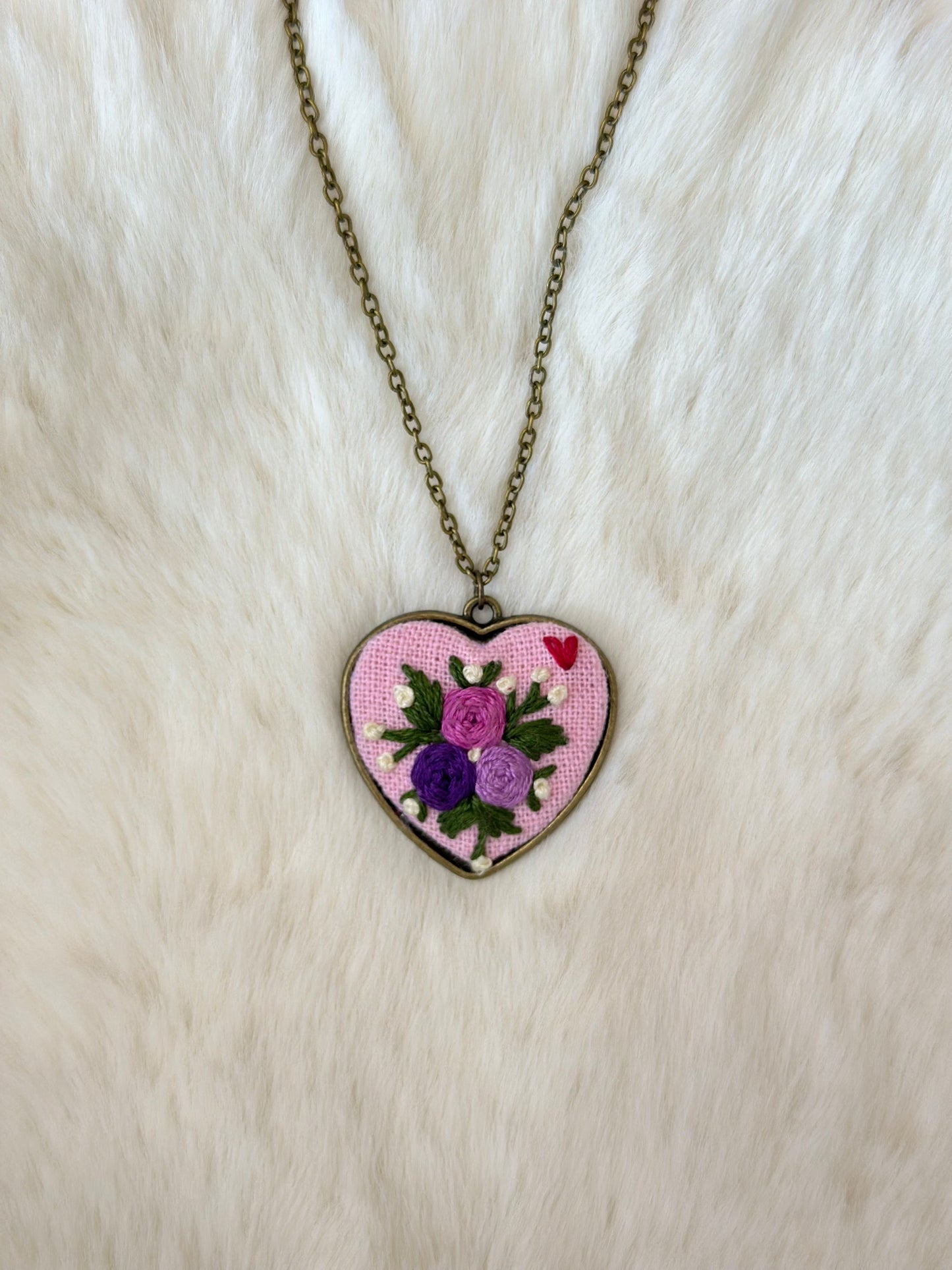Heart embroidered pendant