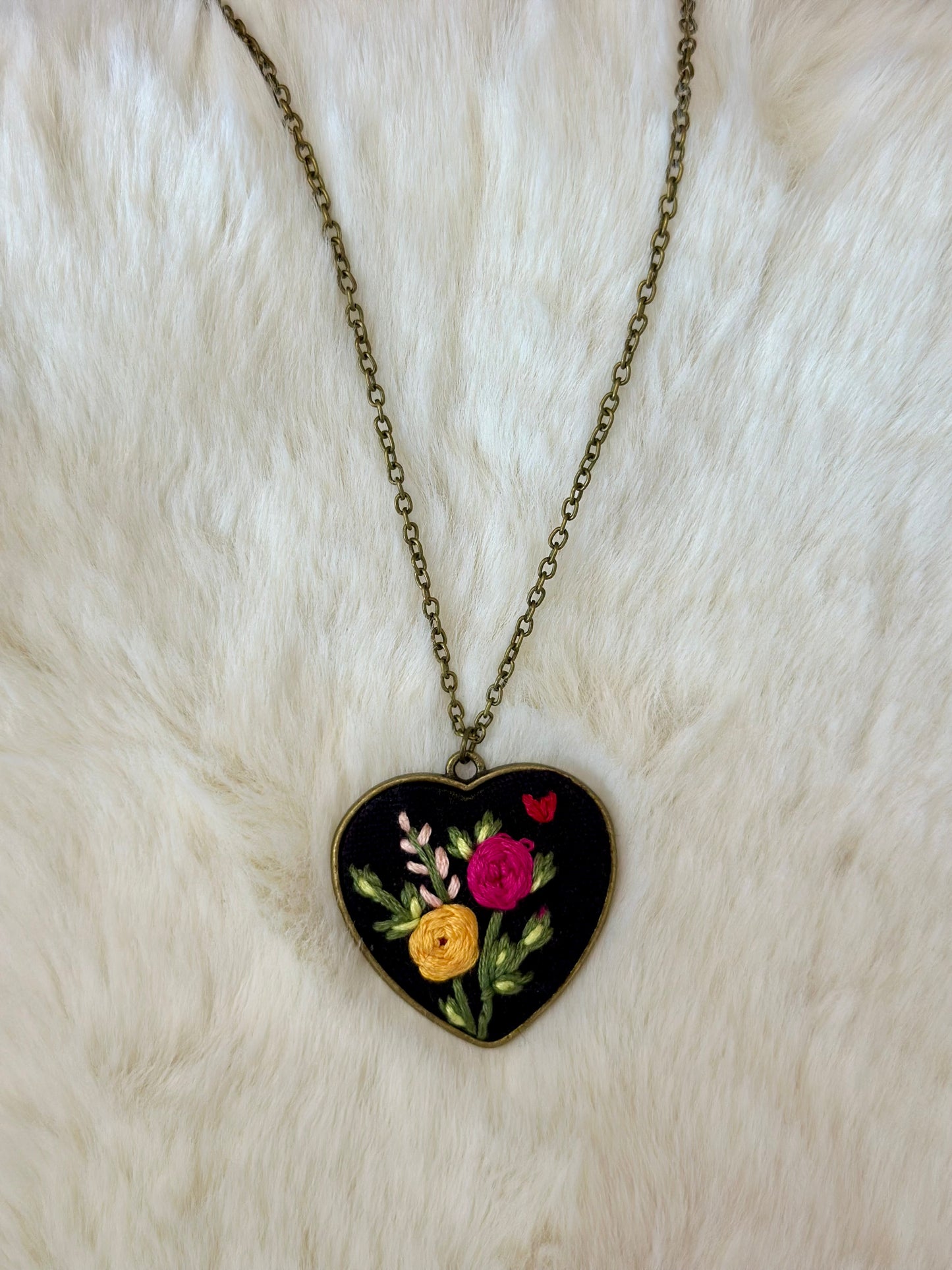 Heart embroidered pendant