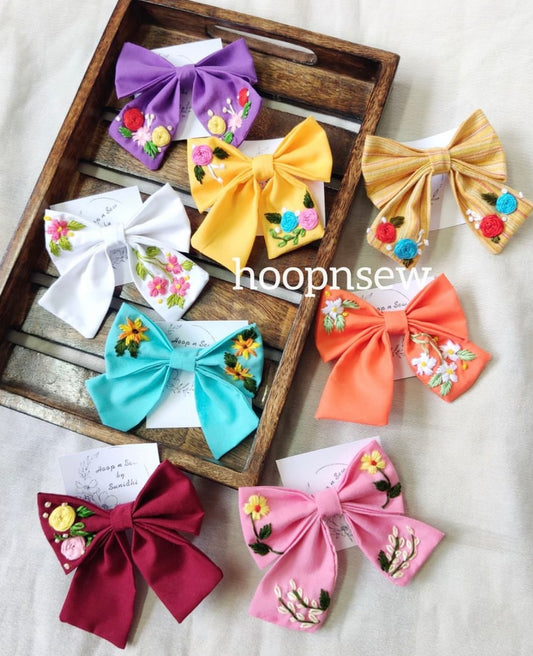 Hand-embroidered floral hair bows