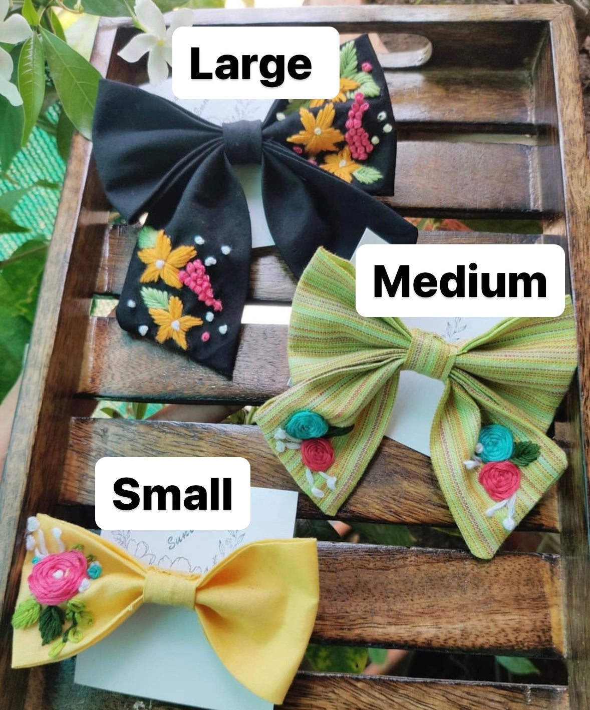 Hand-embroidered floral hair bows